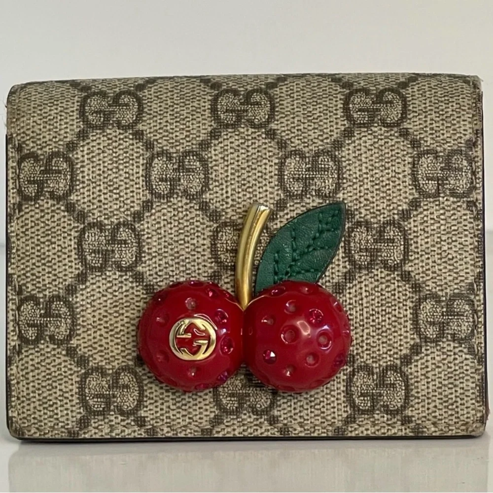 Gucci Beige Wallet with Red Cherry Accent reasonable offers are accepted